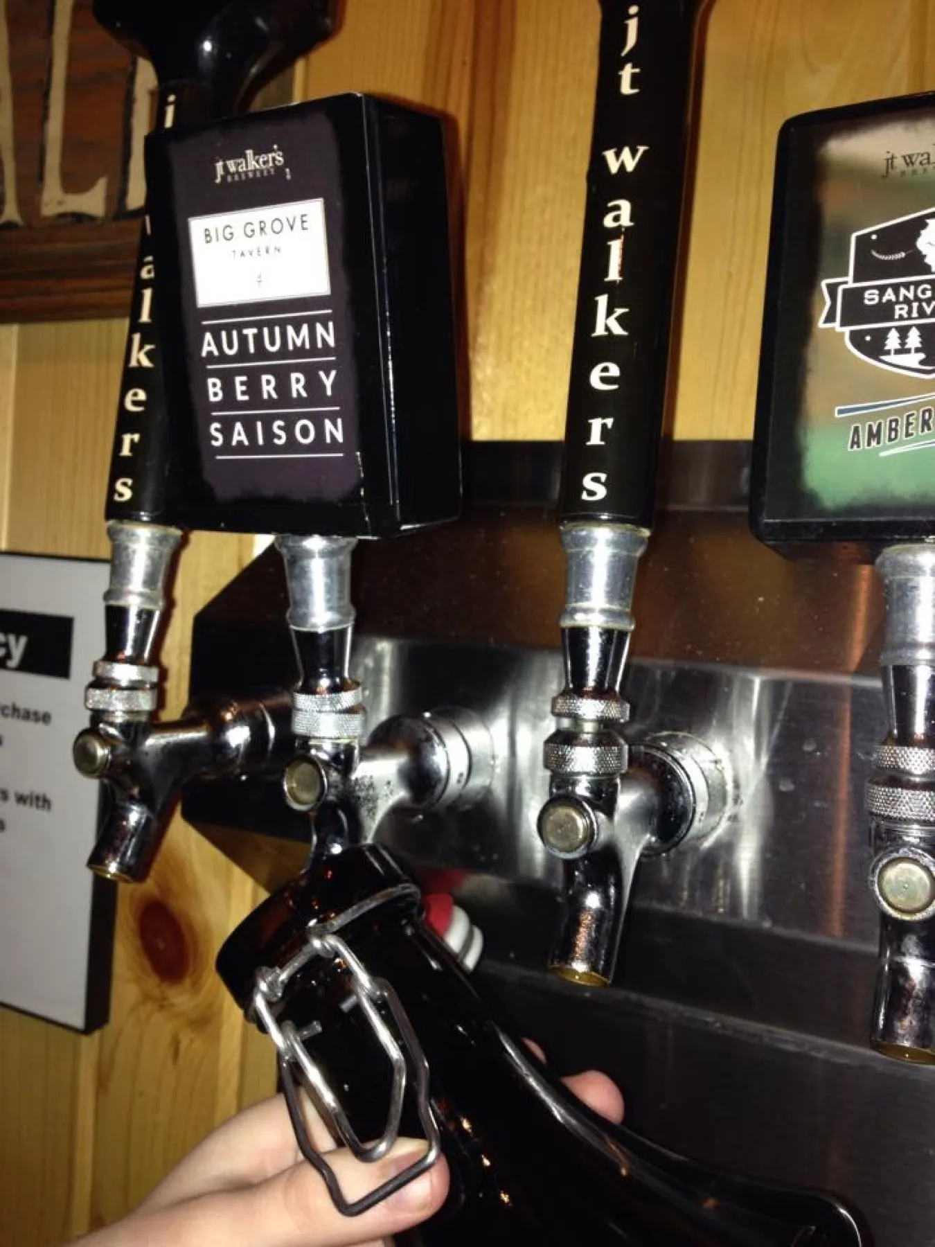A beer tap handle labeled Autumn Berry Saison.
